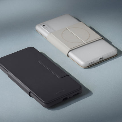 Dark Onyx Boox Palma 2 Pro flip cover next to a white Palma back cover